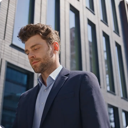 Man in front of a building