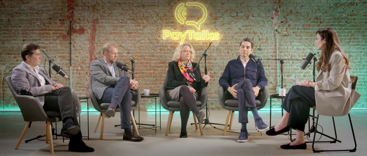 Group of people talking on a podcast
