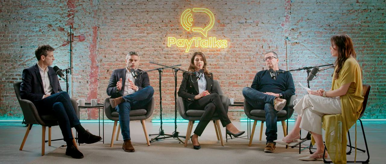 Group of people talking on a podcast