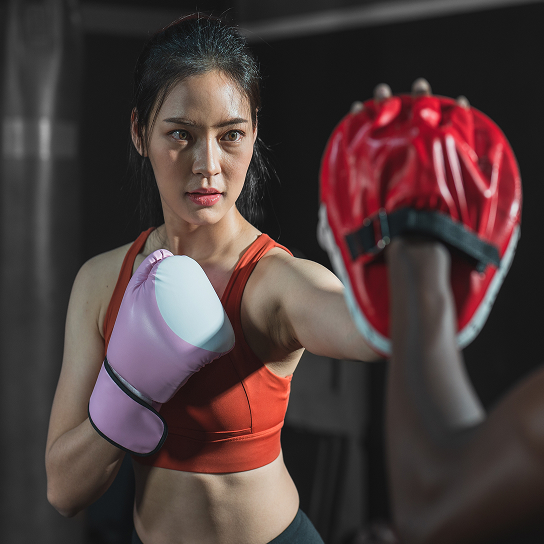 A woman training in boxing
