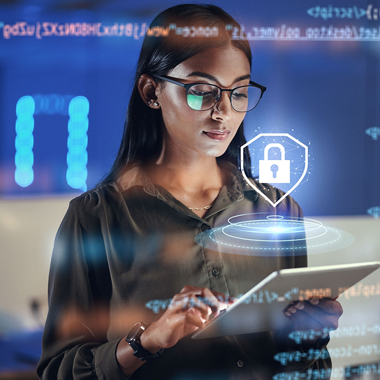 A woman with a tablet in her hand reflected on a computer security screen