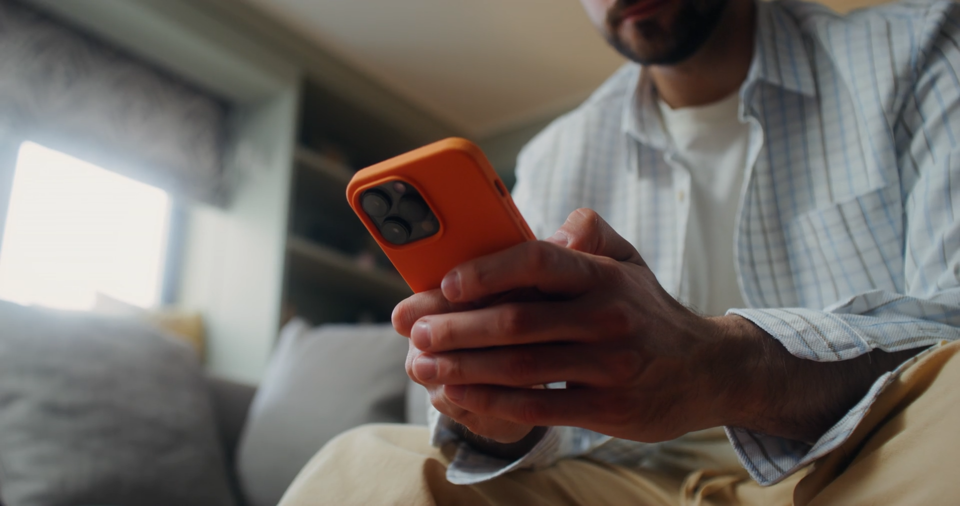 a man holding a mobile phone